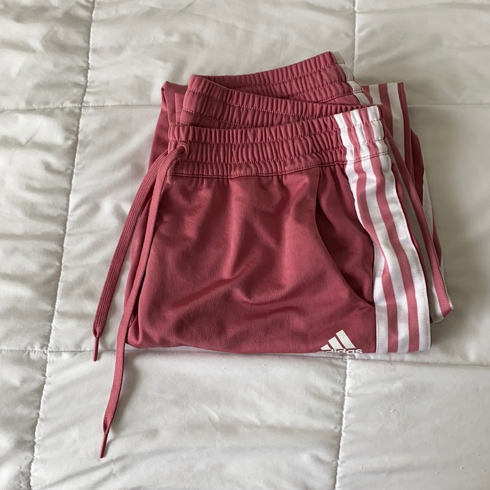 Pink adidas track pant. Only worn a few times.